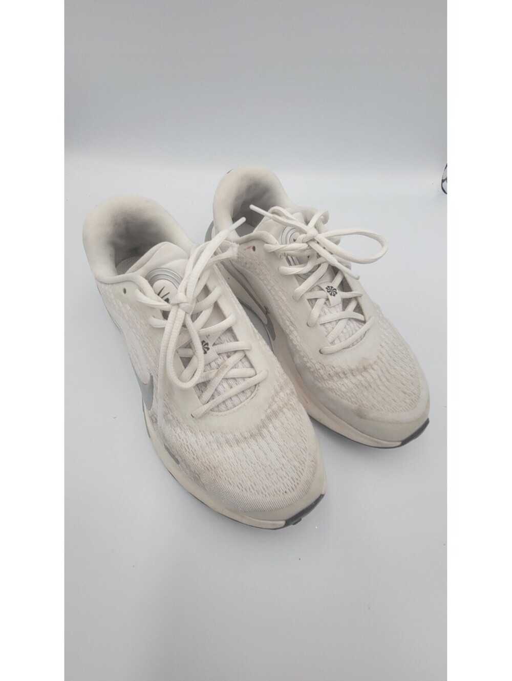 Nike white running shoes